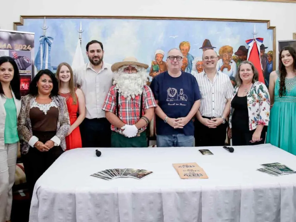 Hugo Passalacqua, Matías Sebely y promotores de la fiesta 