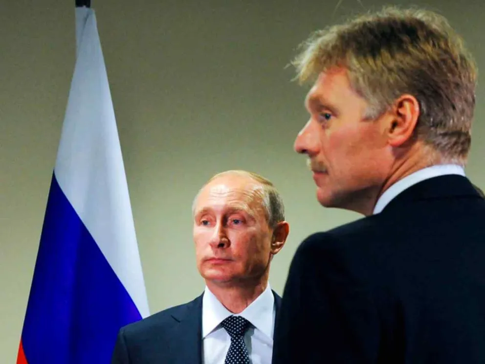 Vladimir Putin y Dmitri Peskov