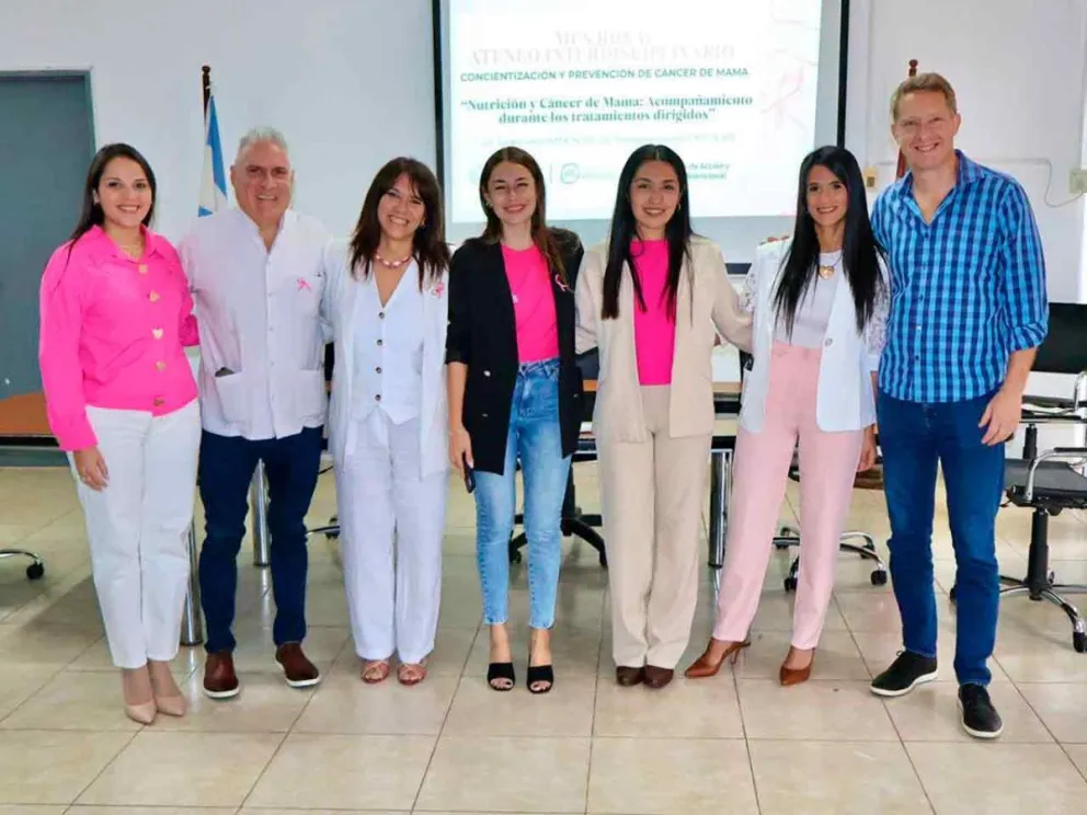 Lisandro Benmaor junto a disertantes