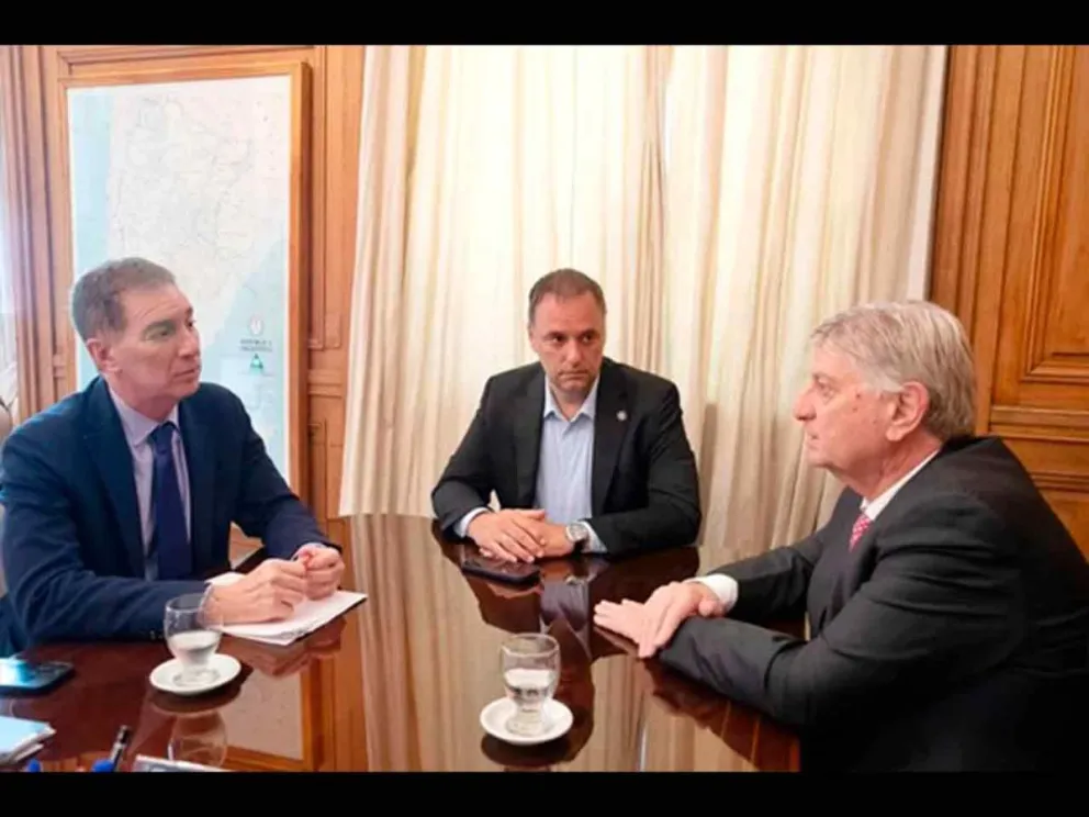 Sergio Ziliotto junto a Adorni y Santilli