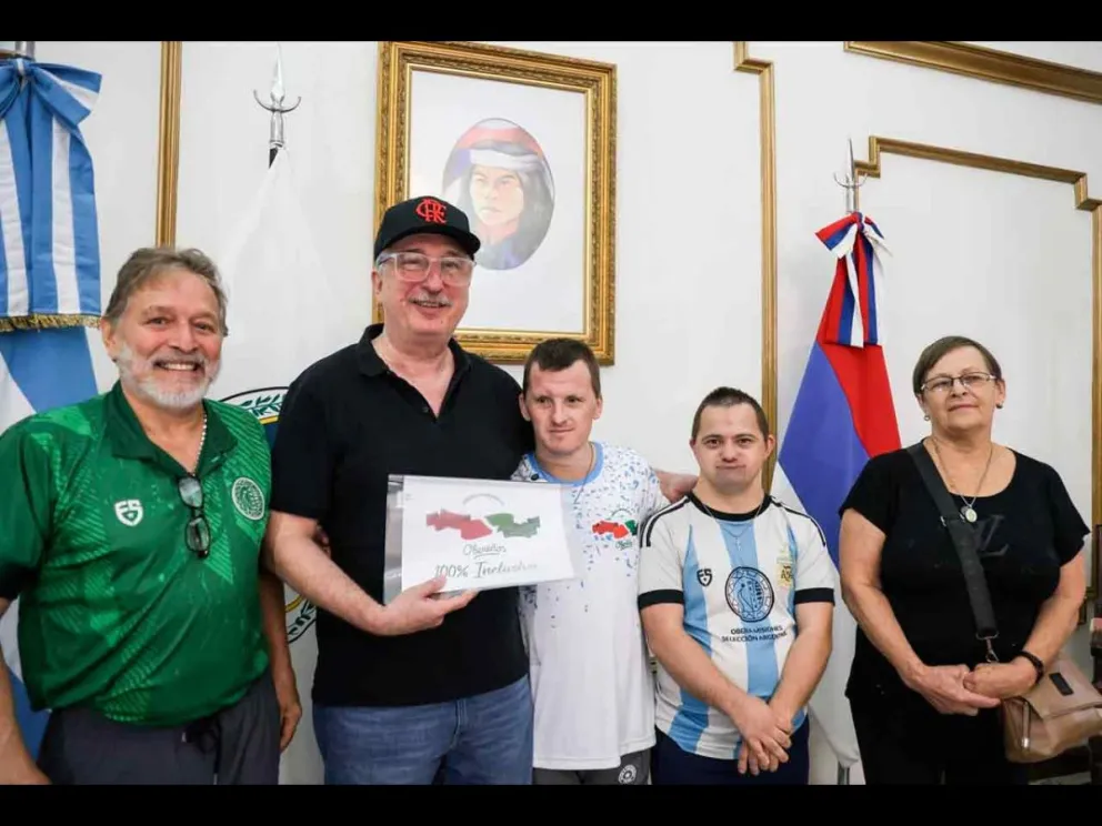 Passalacqua junto a los judocas Kletke