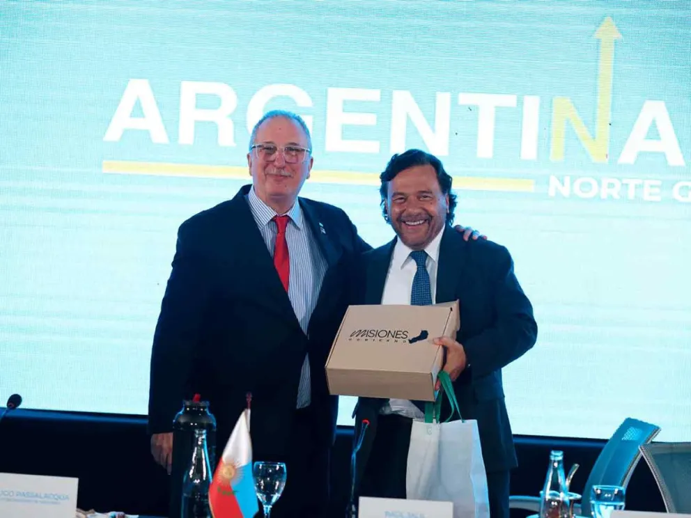 Hugo Passalacqua junto a Gustavo Sáenz