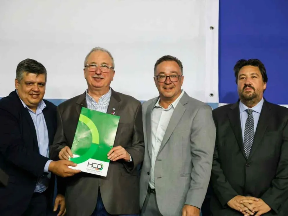 Passalacqua junto a Mac Donald, Llamosas y Closs