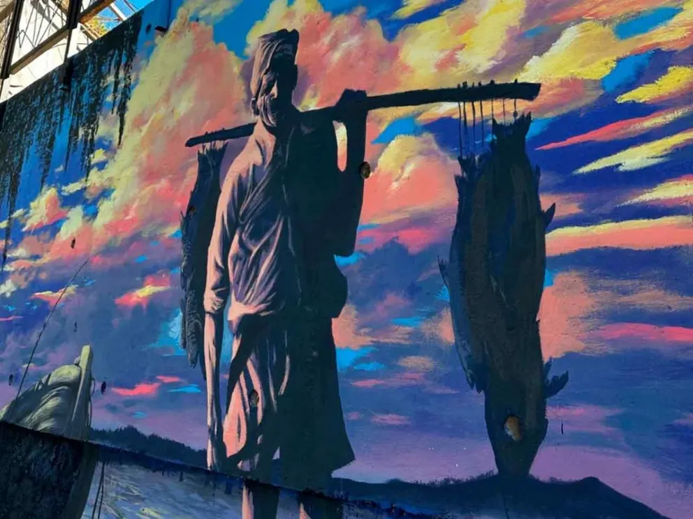 “El pescador de la Ribera” del muralista local Fernando Gross