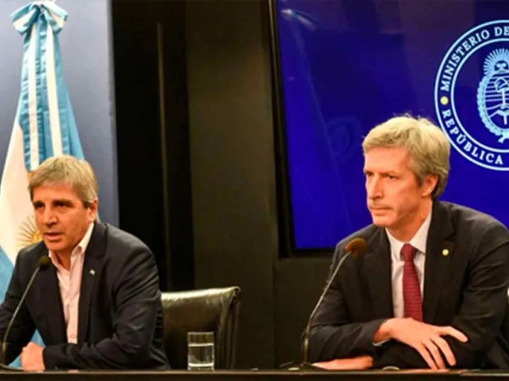 Luis Caputo y Santiago Bausili