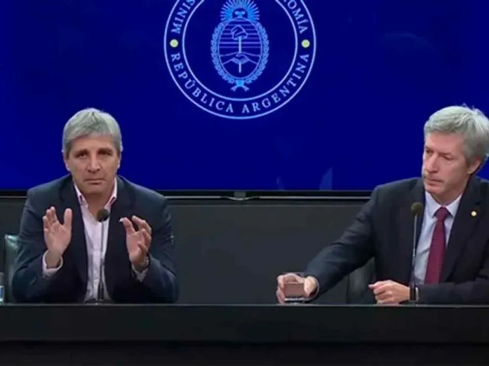 Luis Caputo y Santiago Bausili